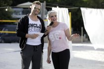 Deutsches Model und Schauspielerin Daniela Katzenberger präsentiert mit Uncle Sam-Gründer Michael Geiss ihre eigene "Uncle Sam-Sportswear-Kollektion am Blackfoot Beach Köln (© Thomas Brill)